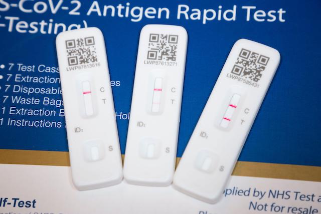 Two positive Covid test results and a single negative test result.